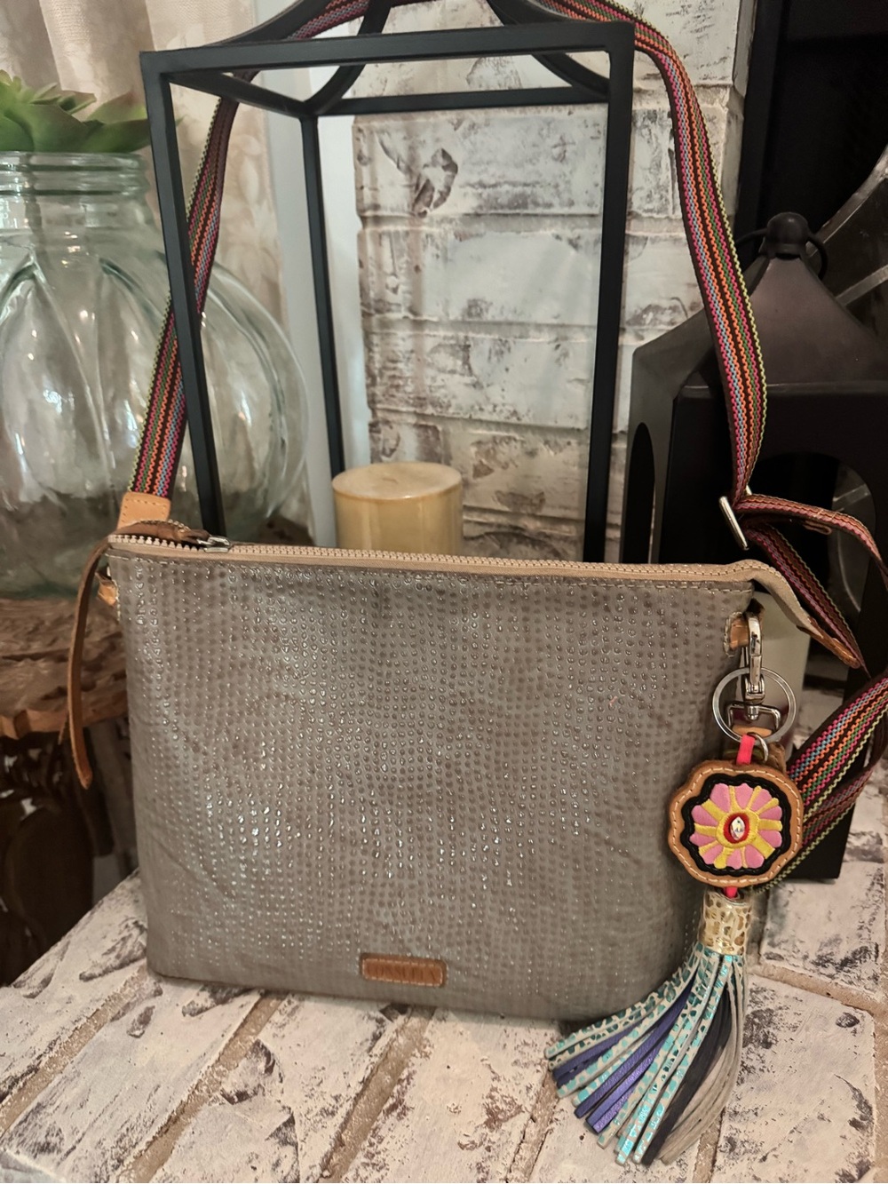 Consuela Taupe Crossbody with Multicolor Tassel Charm